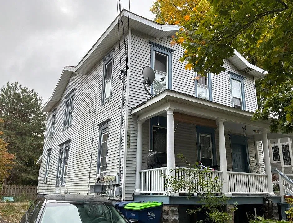 Owner-supplied exterior photo of the N Van Buren St triplex in Bay City, MI